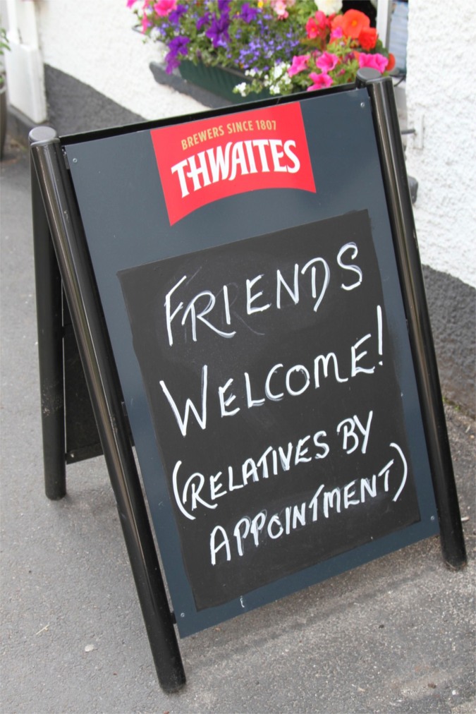 Sign outside The King's Arms pub, Burton-in-Kendal, Cumbria, England
