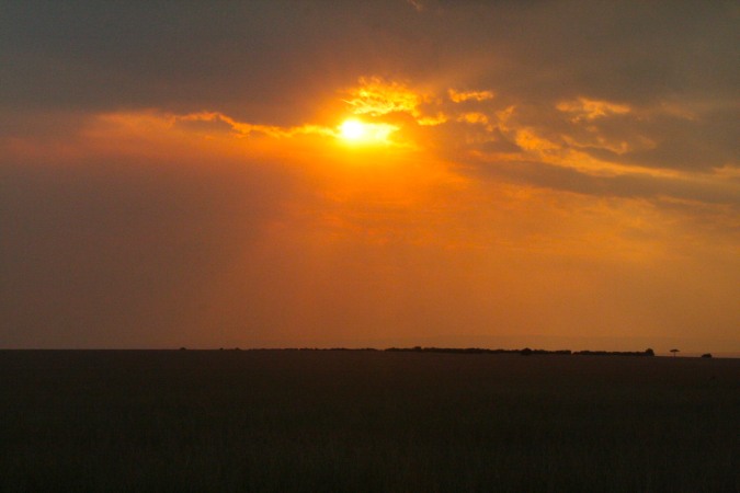 Sunset over the Maasai Mara National Reserve, Kenya, Africa
