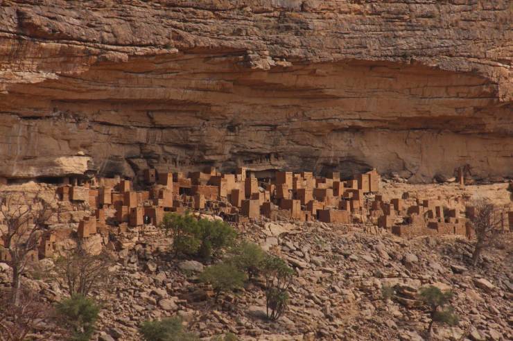 Dogon buildings under the Bandiagara Cliffs, Dogon Country, Mali, Africa