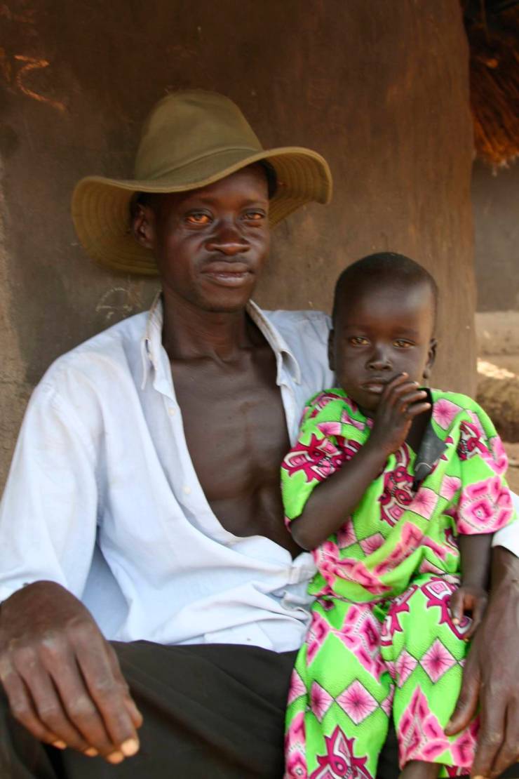 Man and child, Internal Displacement Camp, Gulu, Uganda, Africa